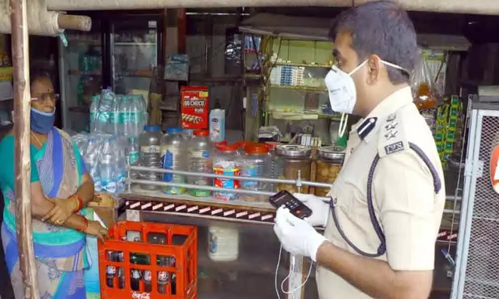 Tirupati SP is giving counseling to petty shops on sales of banned tobacco products