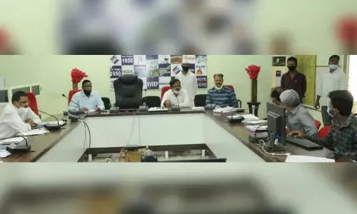 District Revenue Officer B Dayanidhi explaining NGT guidelines to officials on purification of water bodies