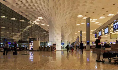 GVK’s tussle with Adani group over airport stake