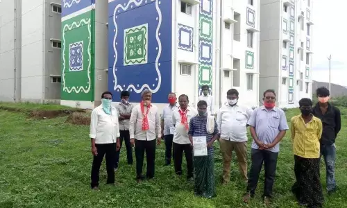 CPM State executive member Ch Babu Rao along with party leaders M Ravi and Bhagya Raju inspecting the housing complex at Jakkampudi on the outskirts of Vijayawada on Thursday