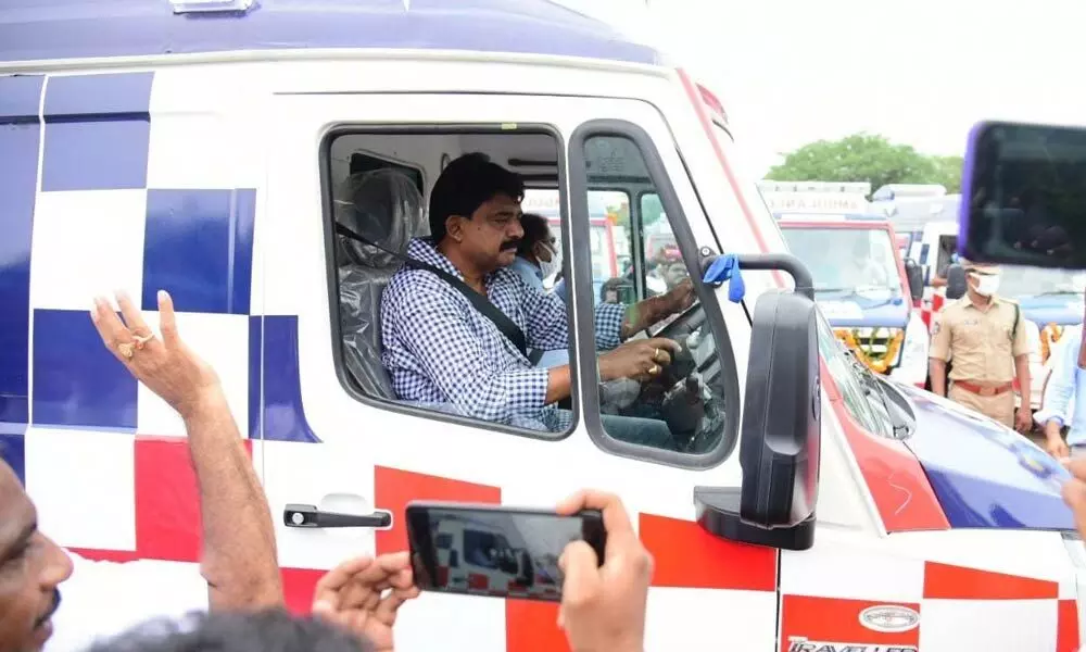 Transport Minister Perni Nani driving 108 ambulance at the Police Parade Grounds in Machilipatnam on Thursday