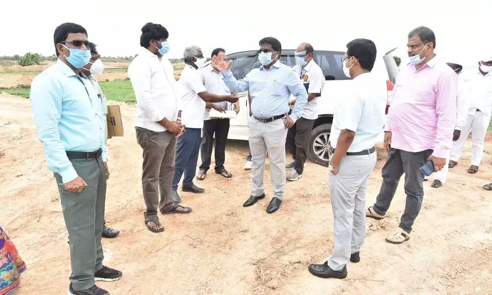 District collector I Samuel Anand Kumar and revenue officials visiting layout development works
