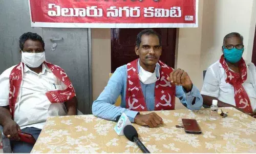 CPM city secretary P Kishore addressing the media in Eluru
