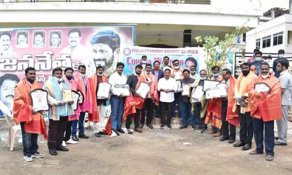 Winners of ‘Corona warrior’ awards at a programme organised by Philanthropic Society in Rajamahendravaram
