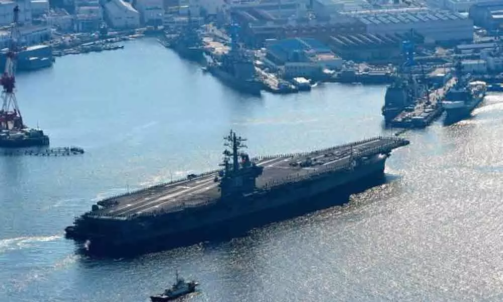 US Navy carriers to traverse South China sea