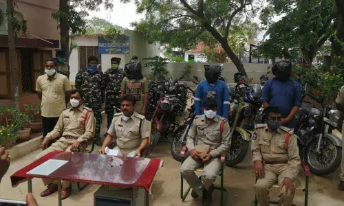 Police officials presenting the arrested persons before the media in Mydukuru of Kadapa district on Monday