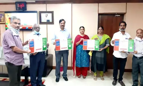 Nannaya University V-C Prof Mokka Jagannadha Rao releasing online competitions brochure in Rajamahendravaram