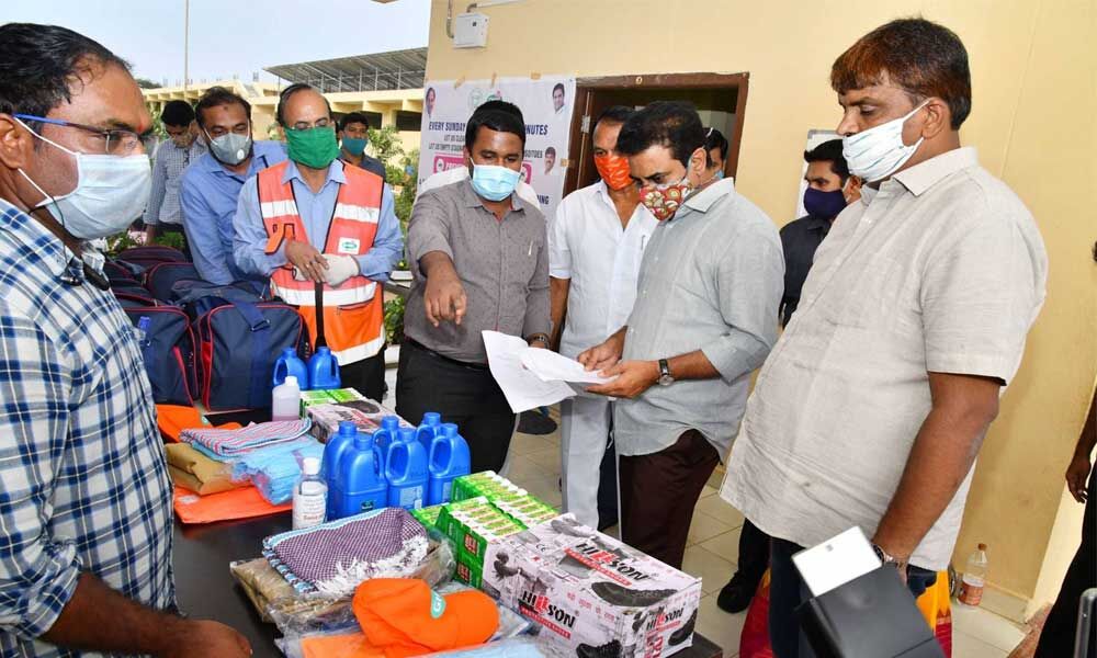 Hyderabad: KTR distributes PPE kits to GHMC staff