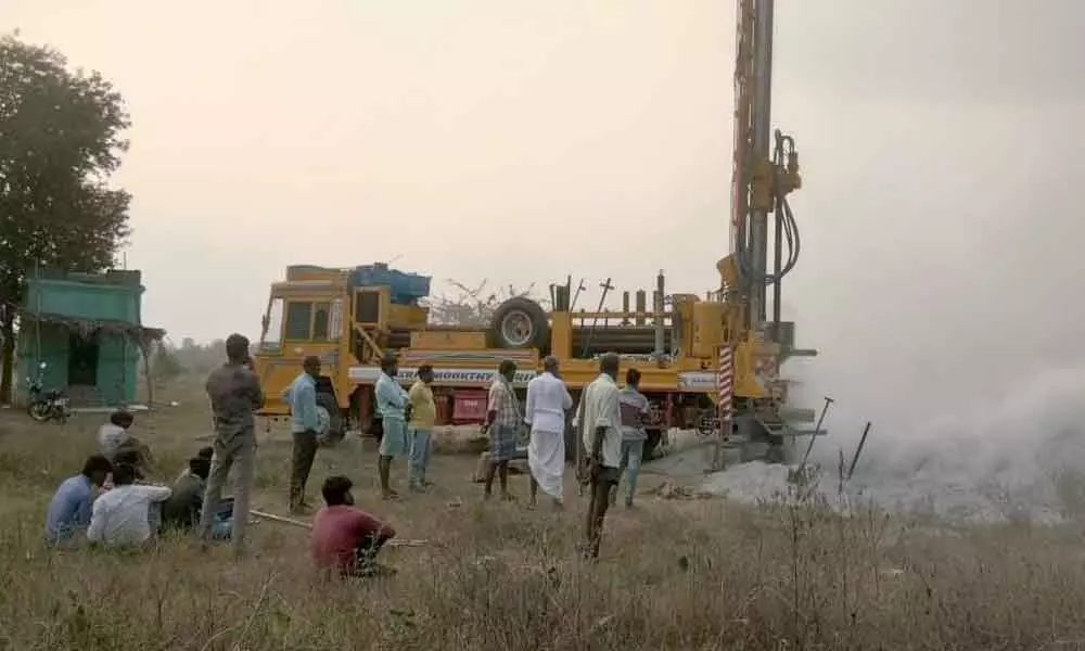A farmer digging a borewell in Kuppam constituency