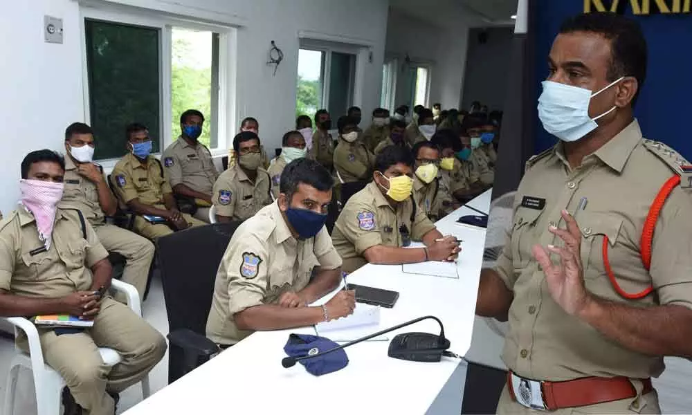 One Town Inspector G Vijay Kumar addressing Blue Colts and patrol car officials at a one-day training programme at the Karimnagar Commissionerate on Monday