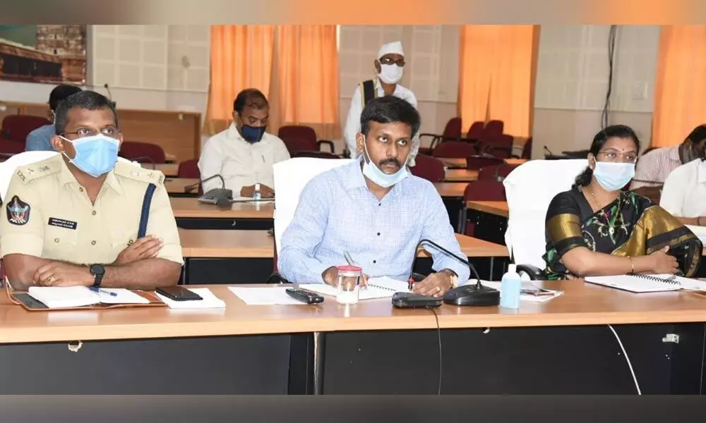 District Collector Ch Harikiran, along with SP KVV N Anburajan and Joint Collector Gouthami, participating in the Chief Minister’s video-conference, in Kadapa on Tuesday