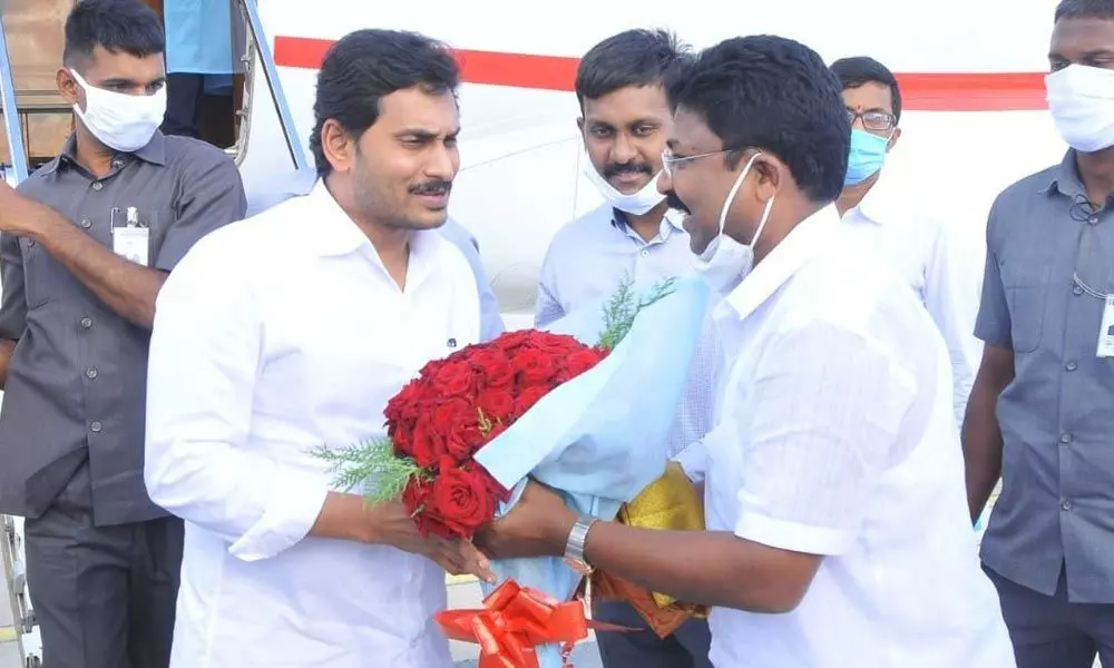 District In-charge Minister A Suresh receiving Chief Minister YS Jagan Mohan Reddy at Kadapa Airport on Tuesday