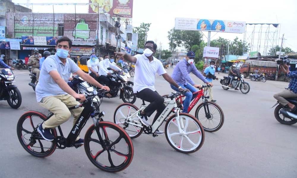 Minister Puvvada Ajay Kumar pedals his way to check works progress in ...