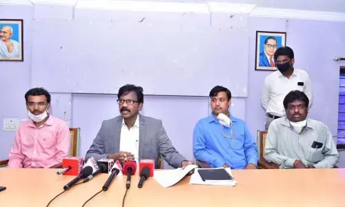 CEO of 108 and 104 ambulance services MS Swaroop addressing the media in Kakinada