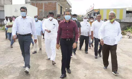 District Collector Musharraf Ali Farooqui inspecting market yard in Nirmal on Thursday