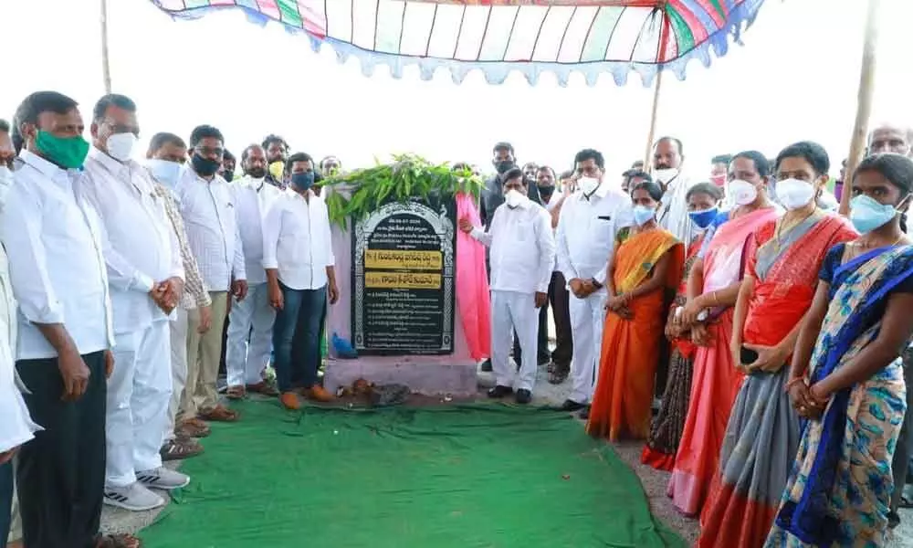 Energy Minister G Jagadish Reddy laying foundation stone for Rythu Vedika building at Thonda village on Thursday. MLA Gadari Kishore also seen