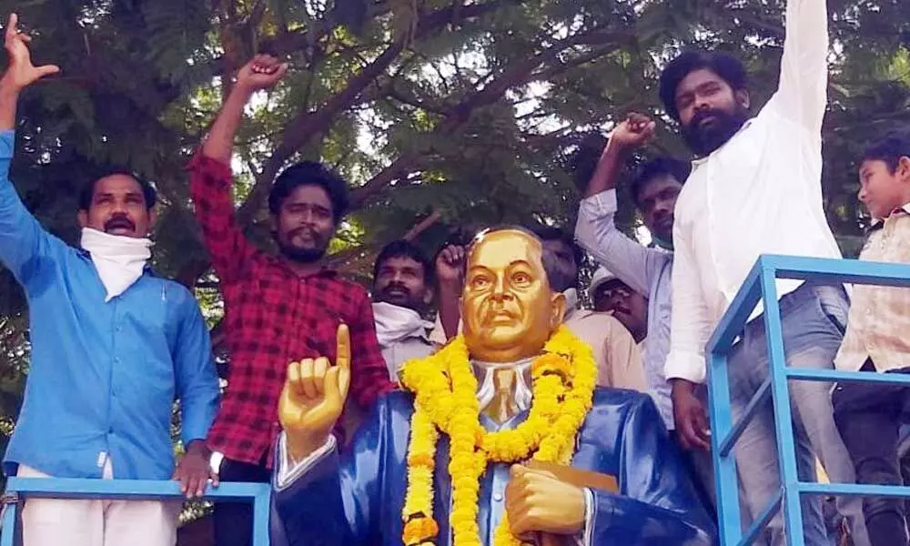 Andhra Mala Mahanadu leaders garlanding the statue of Dr BR Ambedkar in Rajamahendravaram on Friday