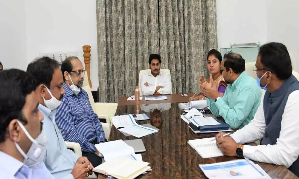 Chief Minister Y S Jagan Mohan Reddy reviewing Recognition of Forest Rights (RoFR) at his camp office in Tadepalli on Friday