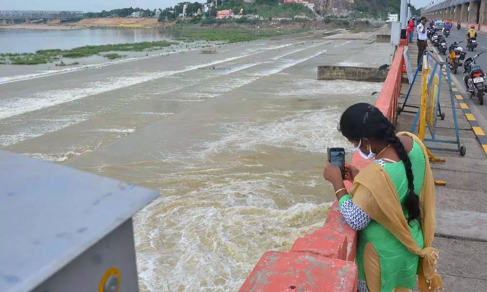 Water released from Prakasam barrage in Vijayawada on Saturday                                                        Photo: Y Vinay Kumar