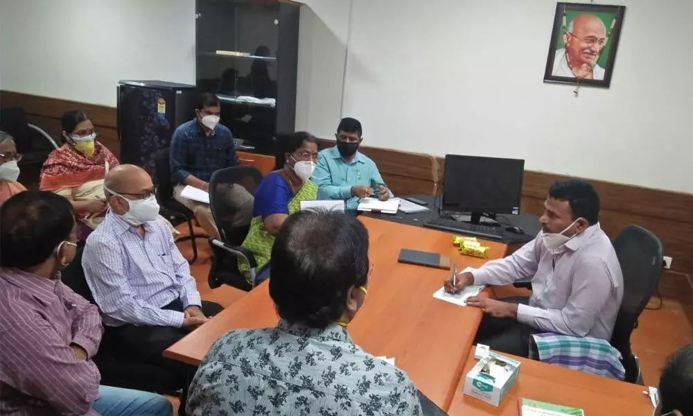 Joint Collector (Development) V Veerabrahmam reviewing with doctors at ESI hospital in Tirupati on Saturday