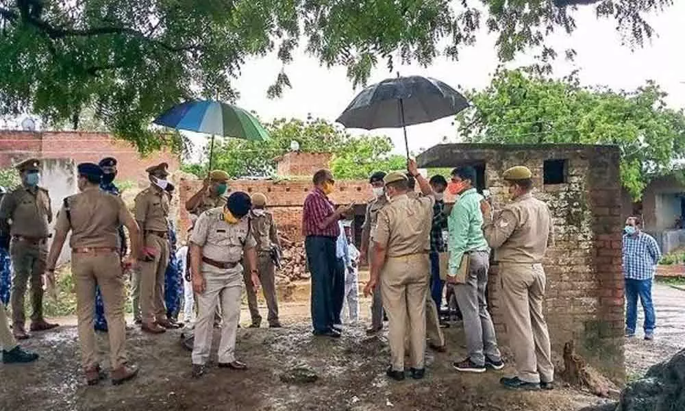 A Special Investigation Team visits the Bikru village, where eight policemen were killed by gangster Vikas Dubey on July 3