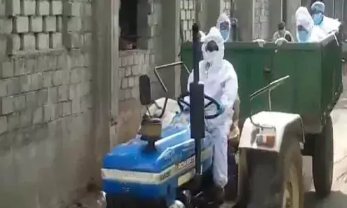 Telangana: Driver out of duty, doctor drives tractor to shift Covid body to burial ground