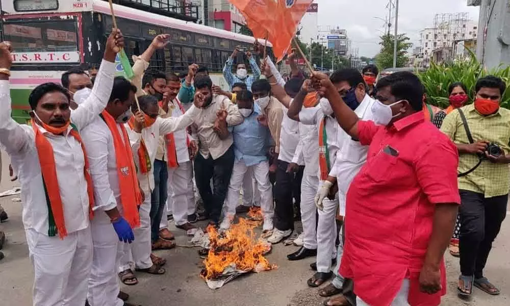 BJP workers burning an effigy of CM KCR in Nizamabad on Monday