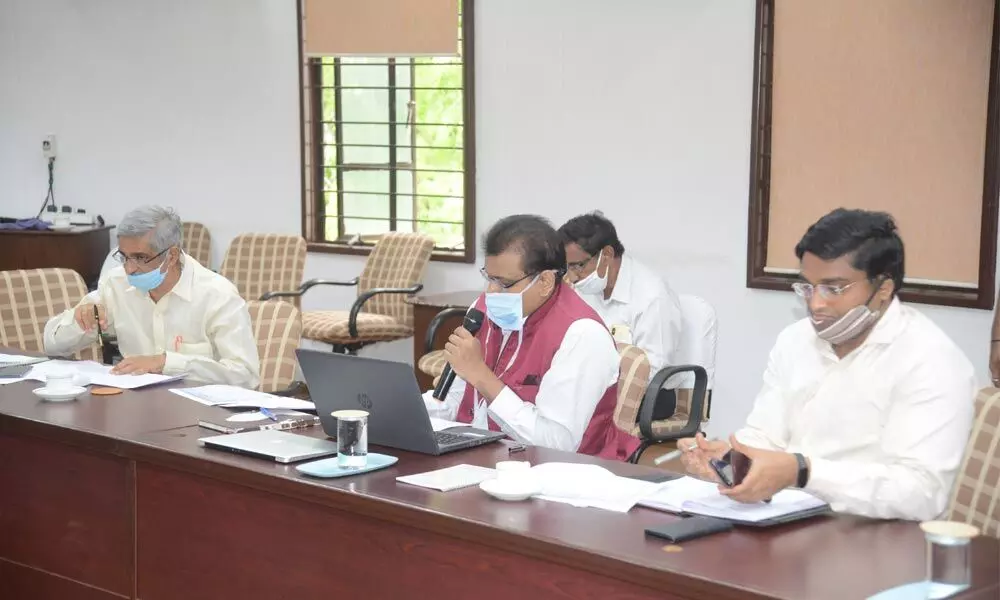 Agriculture Marketing Commissioner P S Pradyumna addressing a meeting at the Tobacco Board office in Guntur