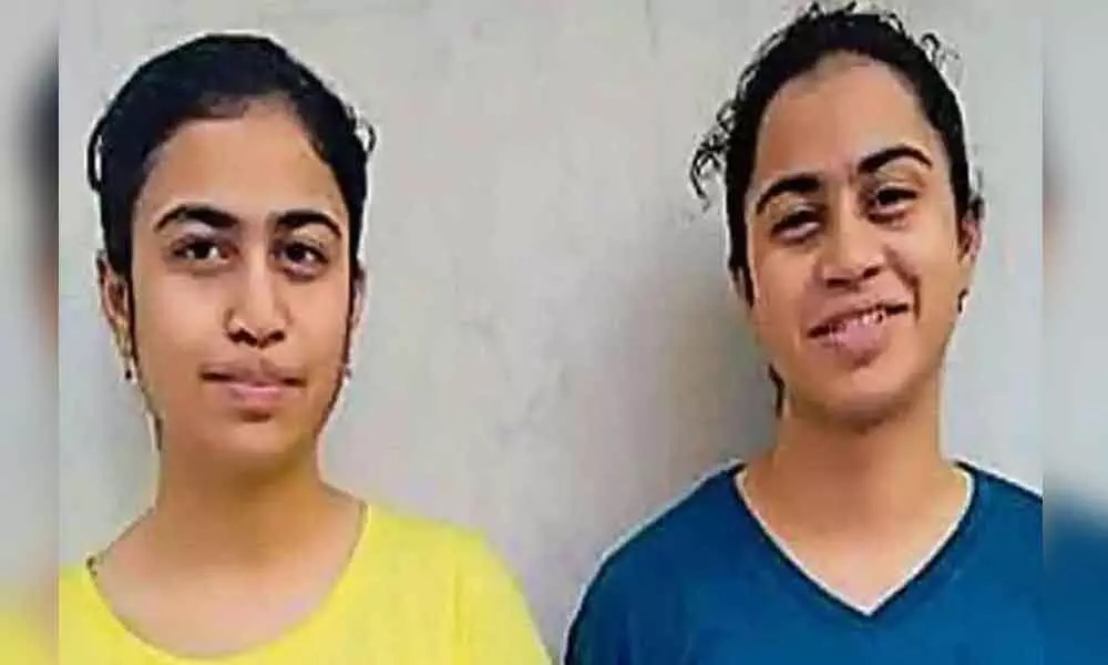 Identical twins score perfectly identical marks in CBSE class 12 exams