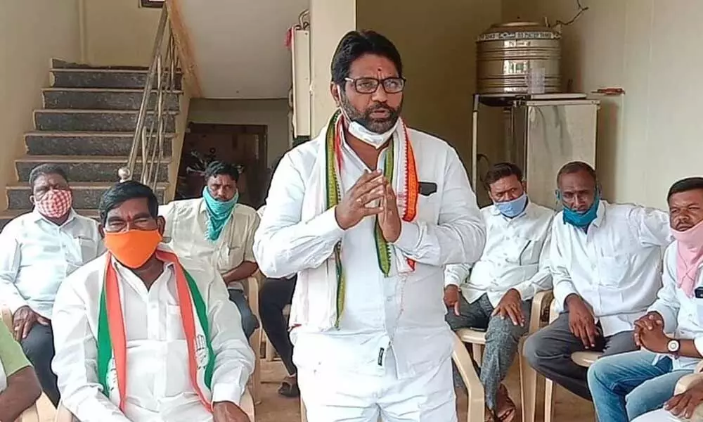 TPCC spokesmen & Mulugu district Congress in-charge Vontela Ratnakar addressing party workers on Tuesday