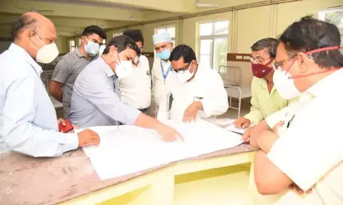 District Collector V Vinay Chand instructing health officials to step up arrangements at VIMS in Visakhapatnam