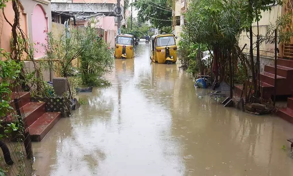 Nallapdu Housing Colony waterlogged due to rains in Guntur on Wednesday