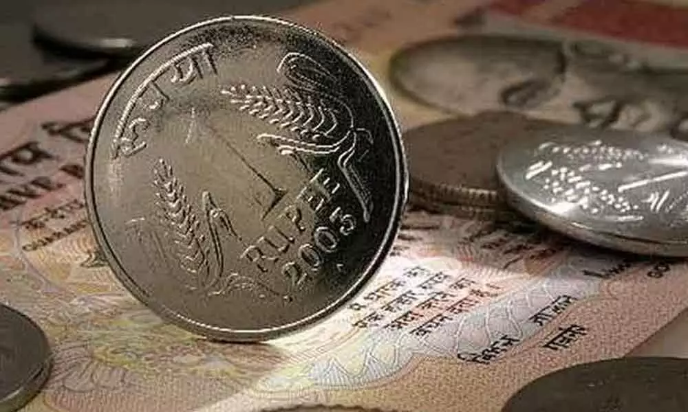 Rupee tumbles by 23 paise against US dollar