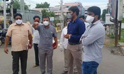 MP Margani Bharat Ram and Commissioner Abhishikt Kishore during an inspection of road works