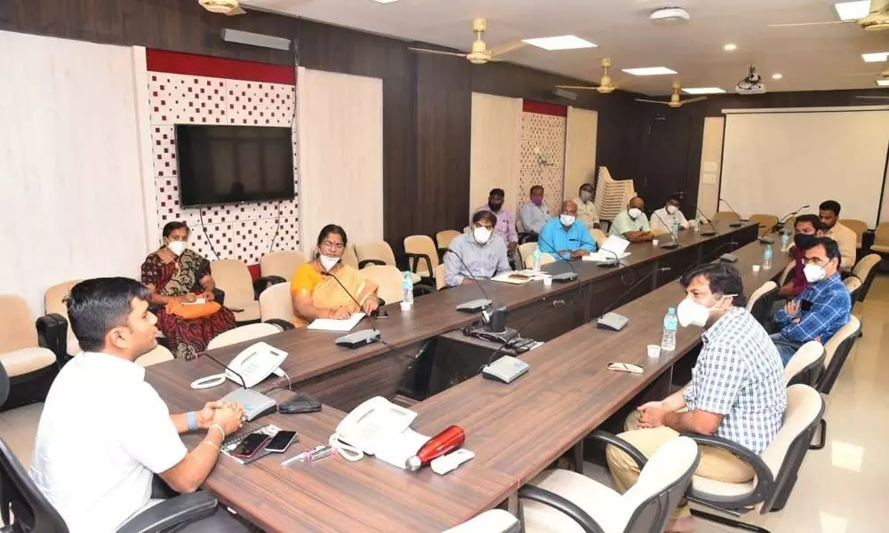 District Collector N B  Gupta addressing the meeting  of private doctors at Collectorate in Chittoor on Saturday