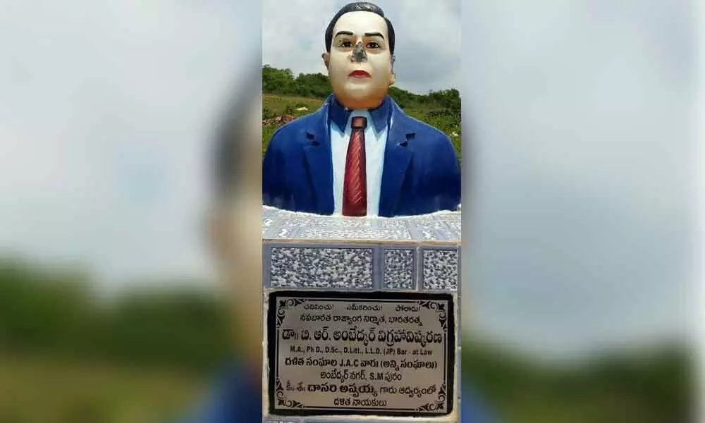 The partially damaged a statue of Dr B R Ambedkar at SM Puram village in Etcherla mandal