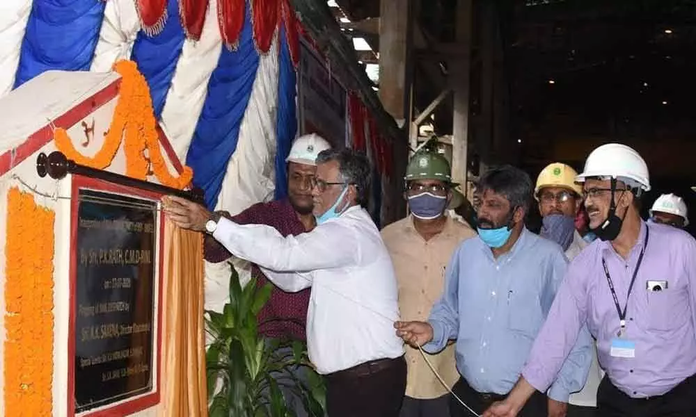 RINL CMD P K Rath inaugurating a railway track connecting bloom storage yard of steel melting shop-2 in Visakhapatnam on Sunday