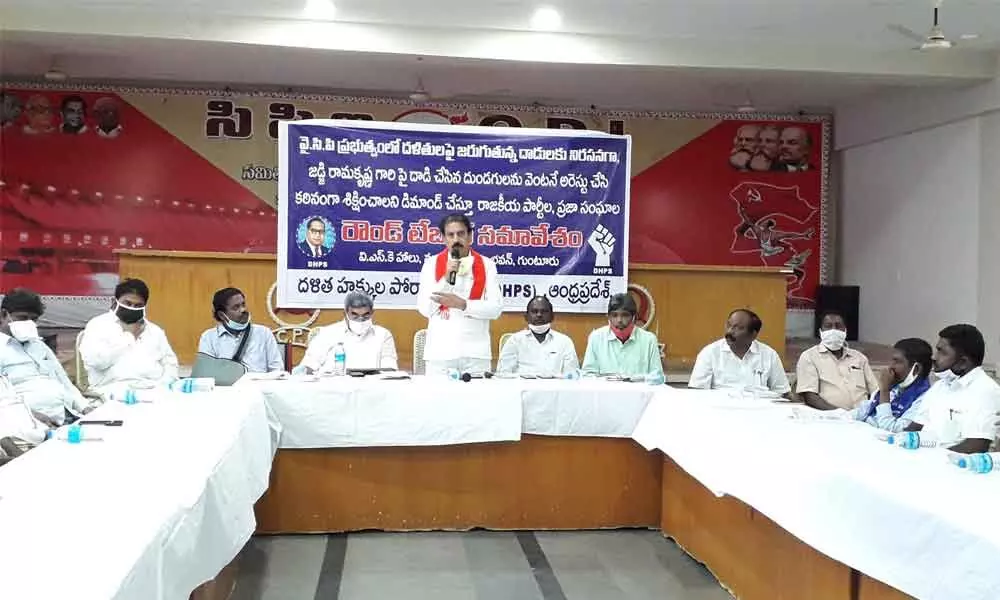 CPI State secretary K Ramakrishna addressing roundtable in Guntur on Sunday