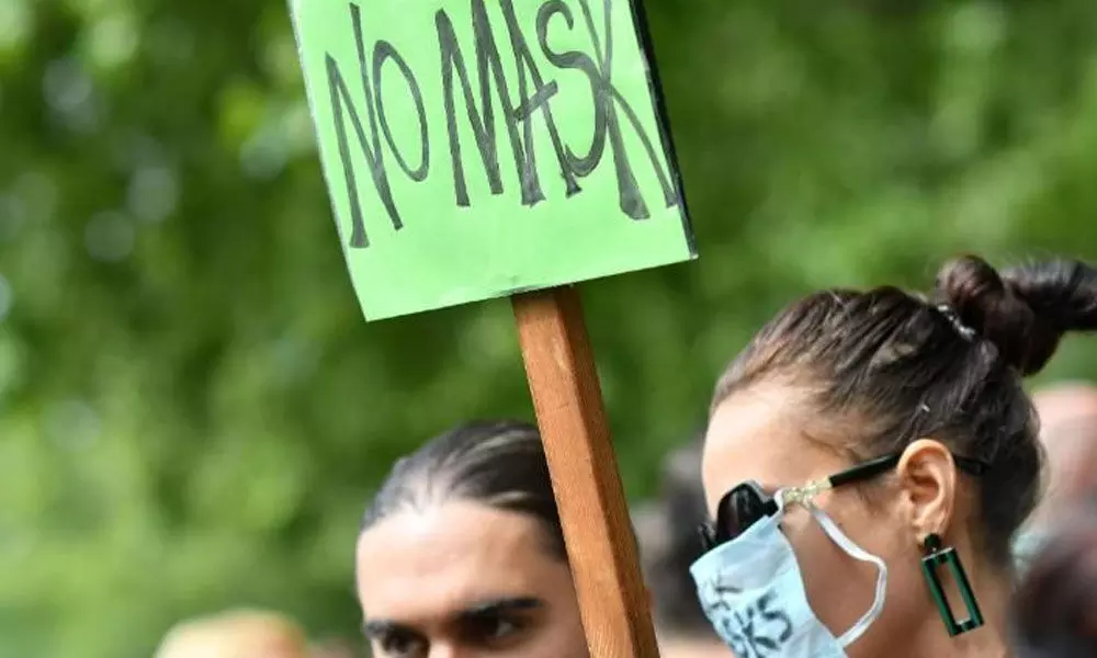 Anti-face mask protesters gather in London