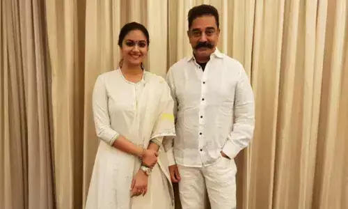 Keerthy Suresh and Kamal Haasan