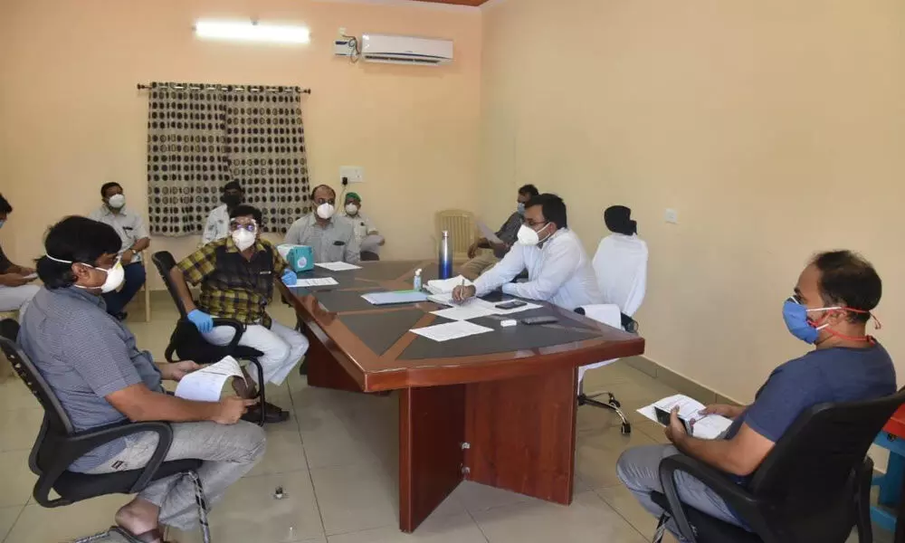 Collector KVN Chakradhara Babu holding a meeting with representatives of the private hospitals in Nellore on Tuesday