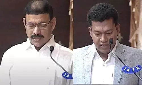 Venu Gopala Krishna and Dr Seediri Appalaraju take oath as Ministers at a swearing-in ceremony