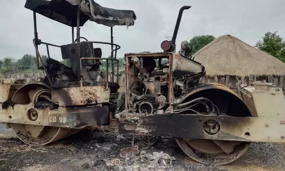 Two vehicles torched by Maoists between Tippuram - Battinapalli villages in Cherla mandal on Wednesday