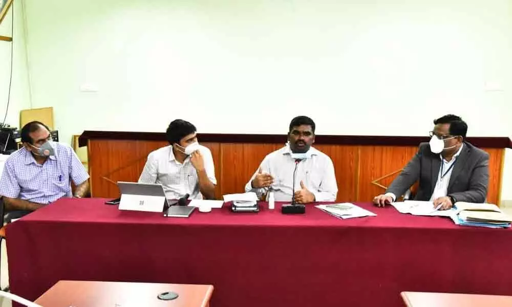 District Collector, G Veera Pandiyan addressing a meeting with doctors in Kurnool on Thursday. Joint Collector, Patanshetty Ravi Subash, Hospital Superintendent, Dr Narendranath Reddy and Dr Chandrasekhar are also seen