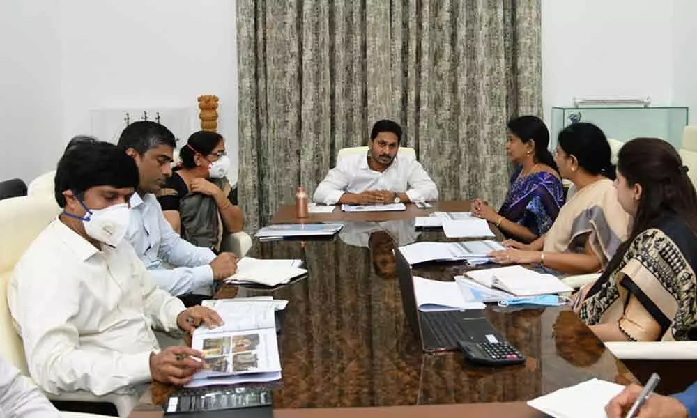 Chief Minister Y S Jagan Mohan Reddy holding a review on activities of Anganwadi centres with women and child welfare department officials at camp office in Tadepalli on Thursday