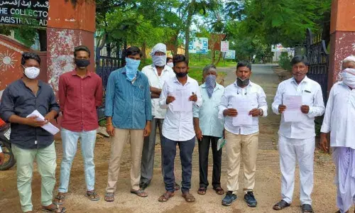 Sangidi villagers staging a protest at Adilabad district Collectorate on Friday