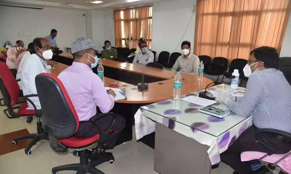 District Collector K V N Chakradhara Babu addressing the Health officials at the GGH in Nellore on Friday