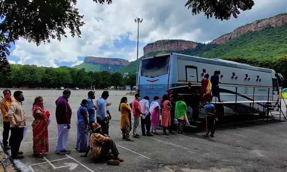 Swab collection at a special vehicle located near Alipiri in Tirupati on Saturday