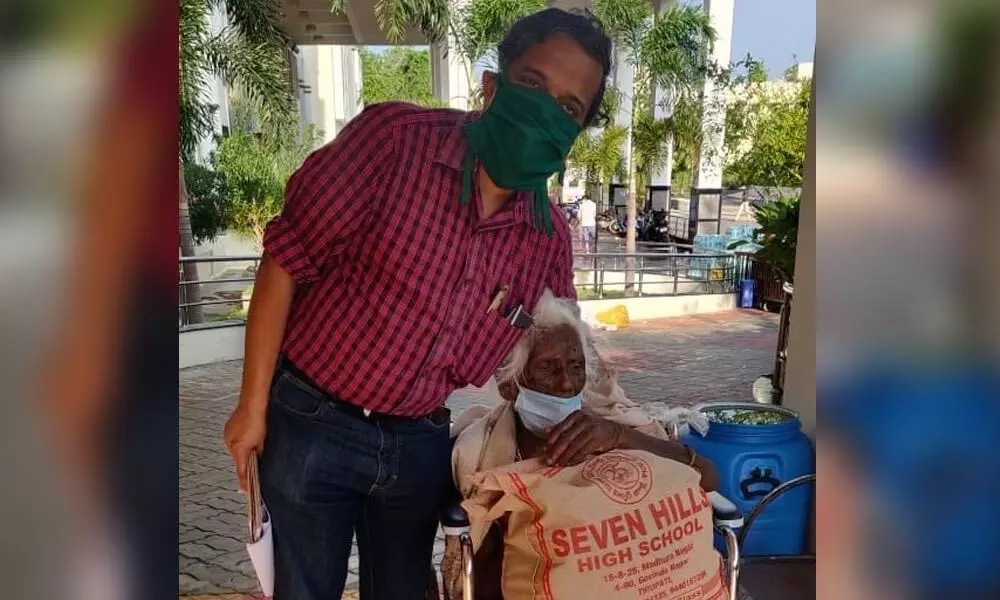 SVIMS Medical Superintendent Dr Ram with the P Mangamma on her discharge