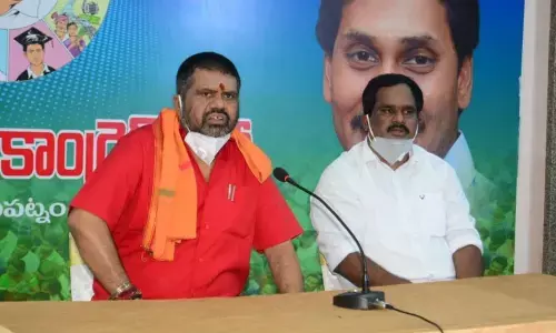 Tourism Minister Muttamsetti Srinivasa Rao and YSRCP city president Vamsi Krishna Srinivasa Rao